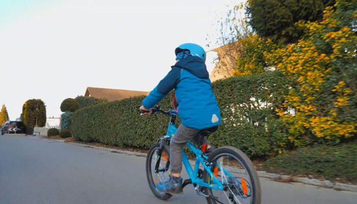 Child In The Blue Jacket Using Mountain Bike (Copy)